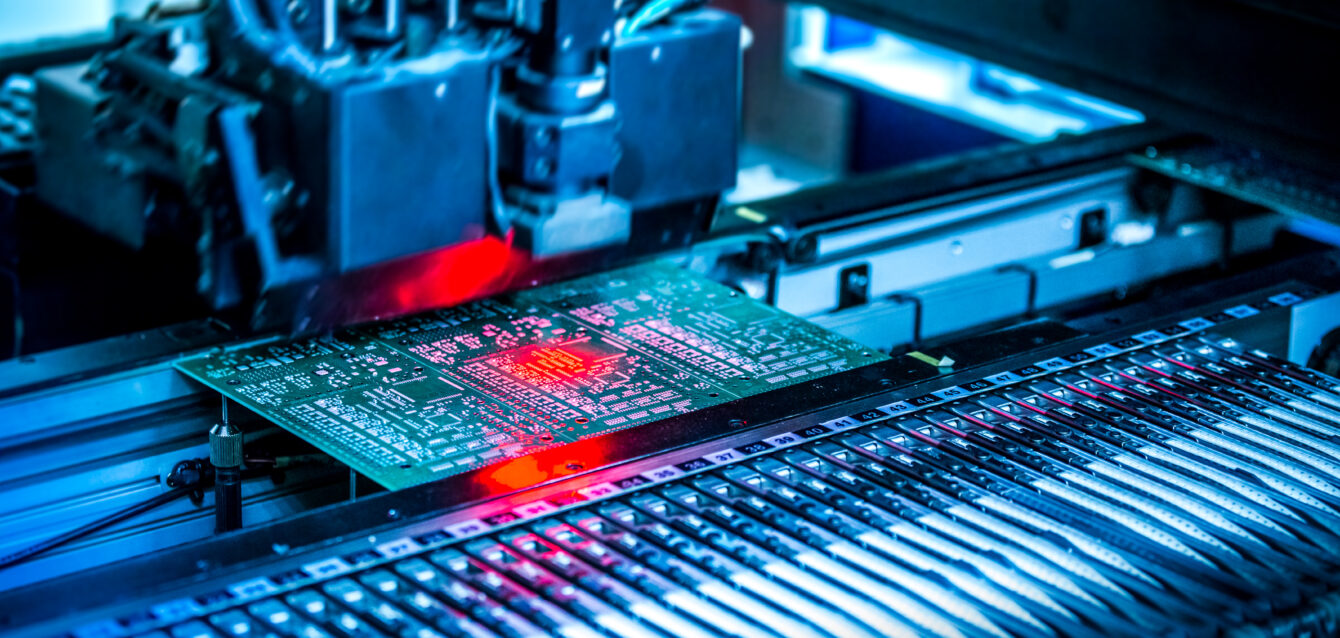 Electronic circuit under surface-mounting machine.